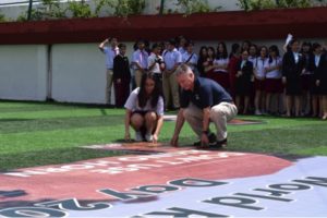 Mr Matthew Norval, COO of Wilderness Foundation Africa with a student from The Asian International School